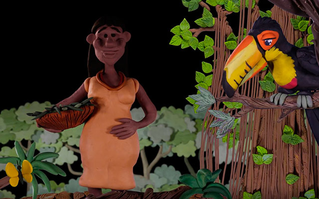 Mujer embarazada sembrando cerca al río Amazonas